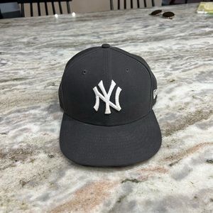 Size 7 grey new era Yankees hat